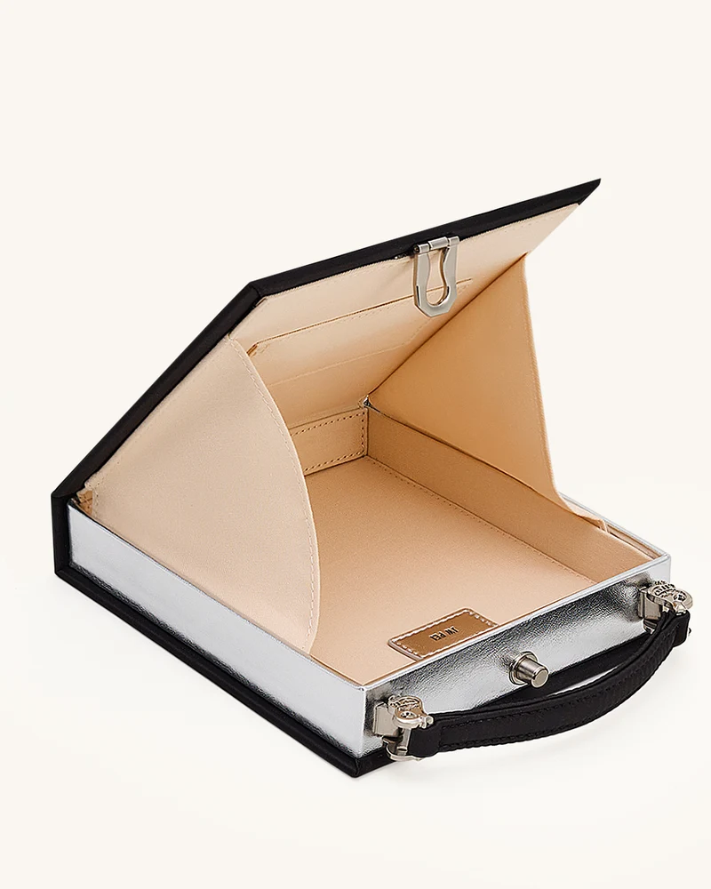 Taya Clutch-Tasche in Buchform mit Weinglas-Welpenmuster - Schwarz