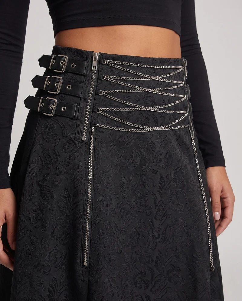 Damen modischer Rock mit dekorativen Riemen und Kettenakzenten Nord Taschen
