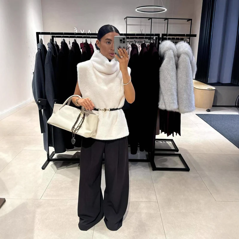 Damen Ärmellose Kunstfell-Weste mit Rollkragen und Taillengürtel Nord Taschen