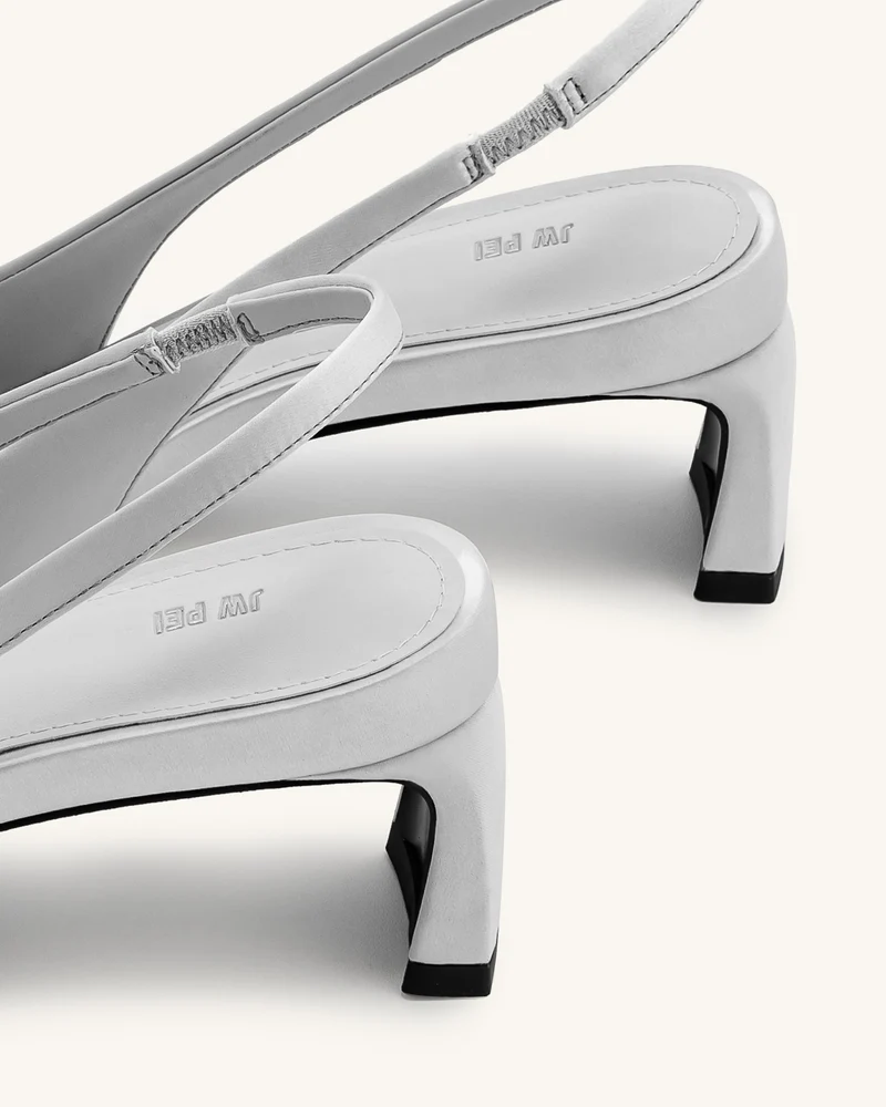Queena Slingback-Pumps mit floralen Applikationen - Silber