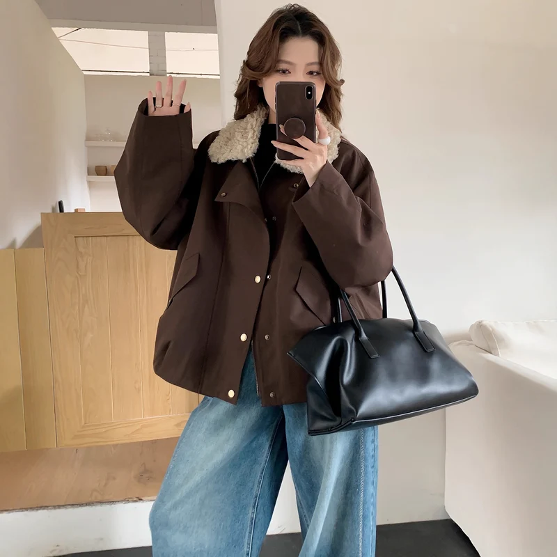 Damen Oversize-Kurzjacke mit Teddykragen und Pattentaschen Nord Taschen