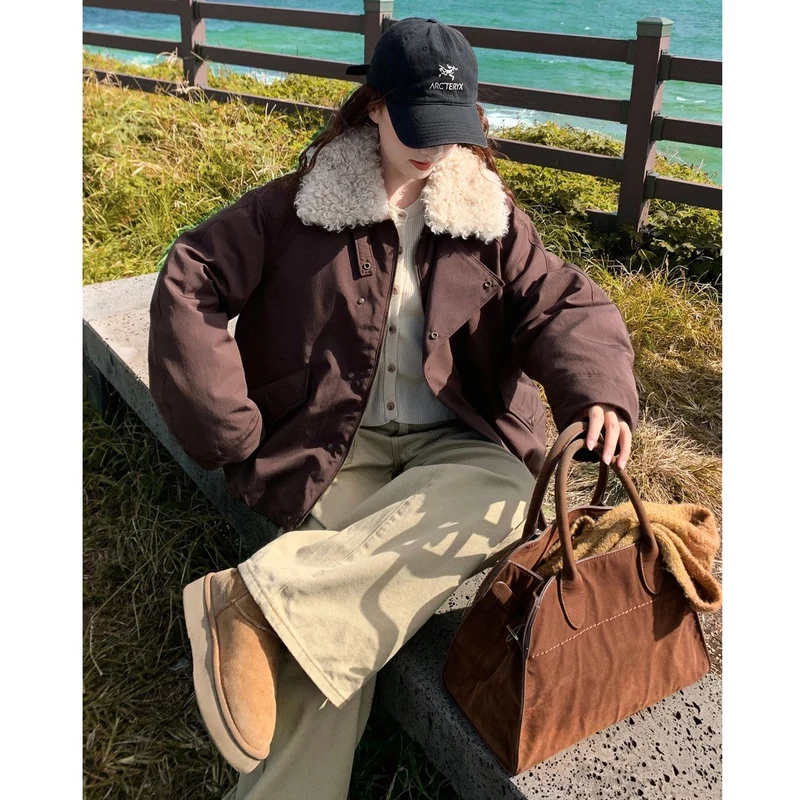 Damen Oversize-Kurzjacke mit Teddykragen und Pattentaschen Nord Taschen