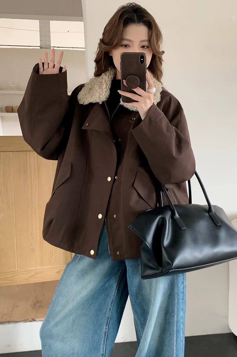 Damen Oversize-Kurzjacke mit Teddykragen und Pattentaschen Nord Taschen