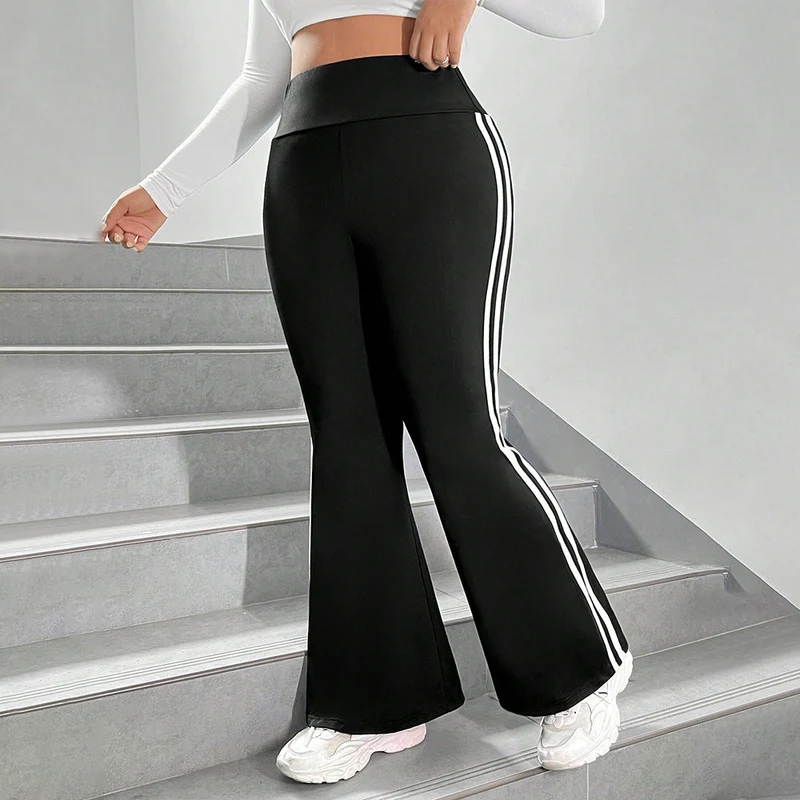 Damen Sportliche Flared Leggings mit elastischem hohen Bund und seitlichen Streifen Nord Taschen