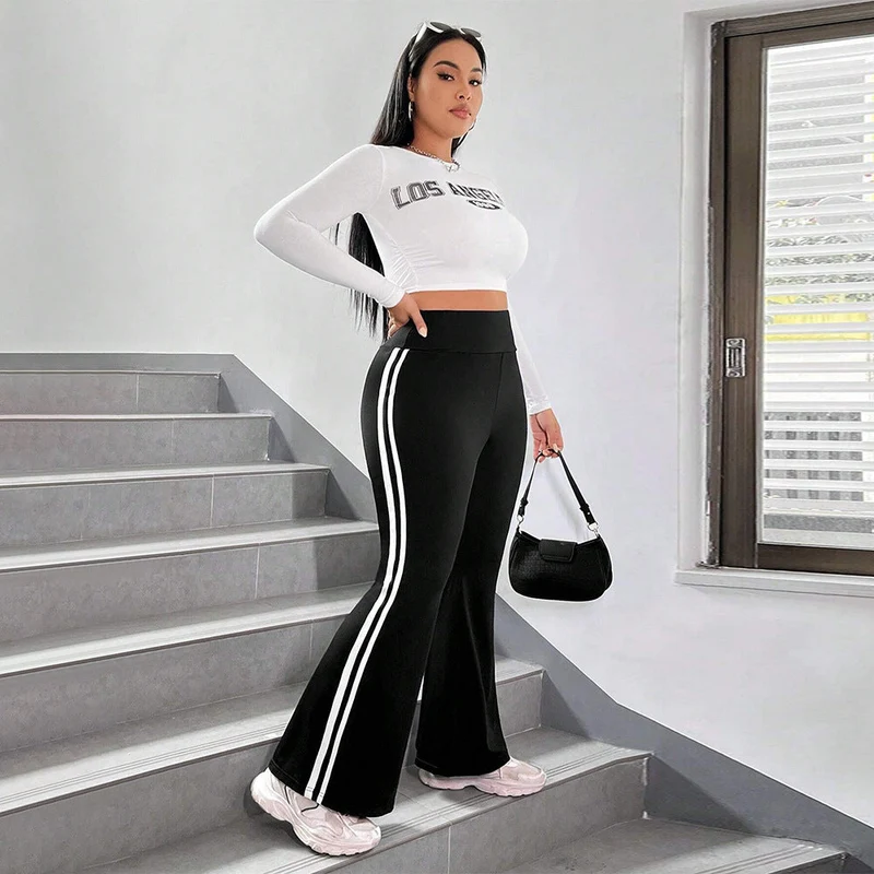 Damen Sportliche Flared Leggings mit elastischem hohen Bund und seitlichen Streifen Nord Taschen