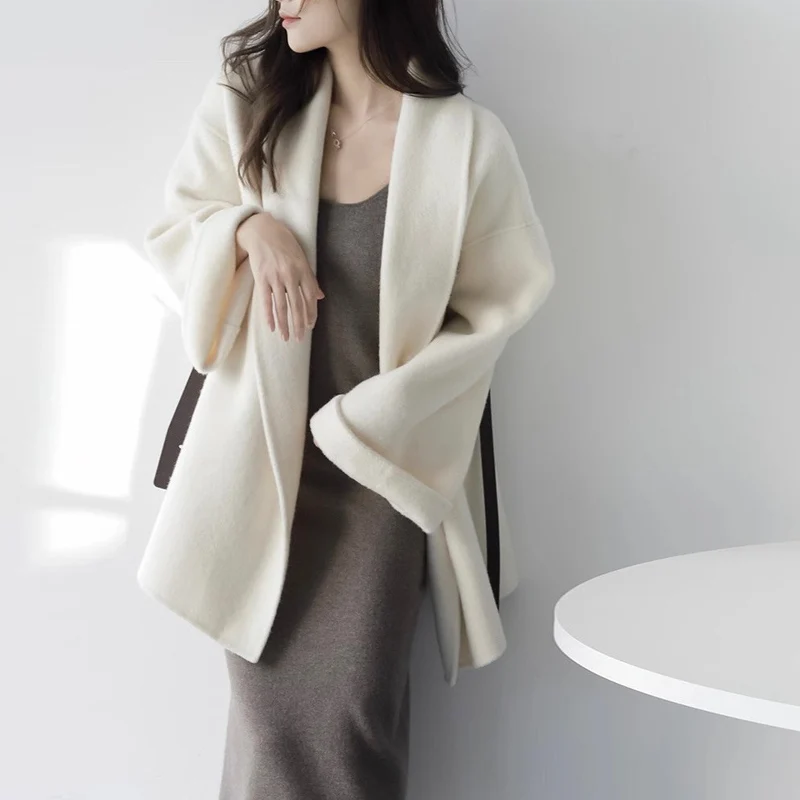 Damen Schicke und elegante Wickeljacke Nord Taschen