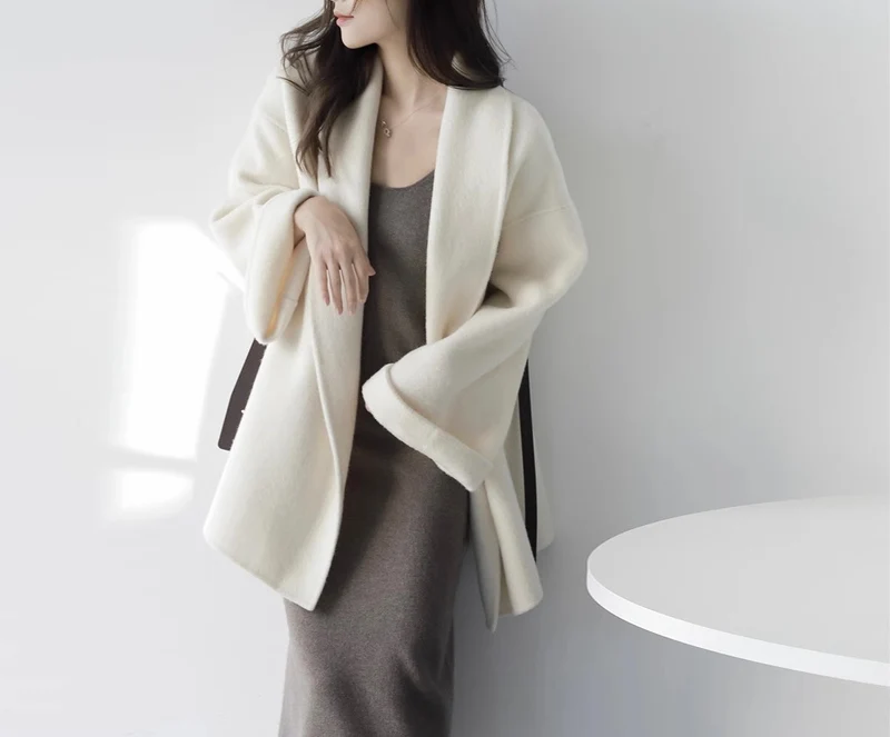 Damen Schicke und elegante Wickeljacke Nord Taschen