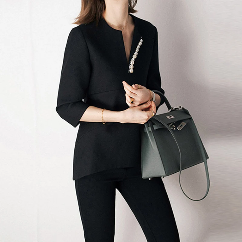 Damen Elegante und stilvolle Bluse mit Perlen-Detail Nord Taschen