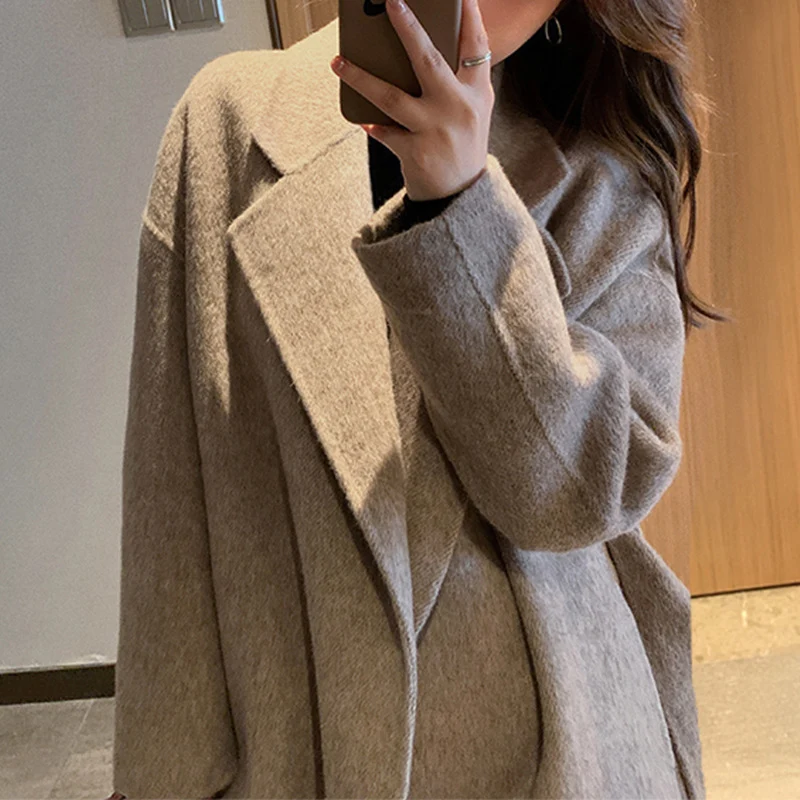 Damen Elegante und lässige Oversized-Wolljacke Nord Taschen
