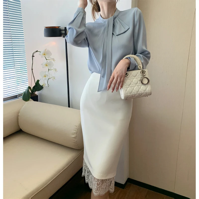 Damen Elegante und figurbetonte Bluse mit Schleifendetail Nord Taschen