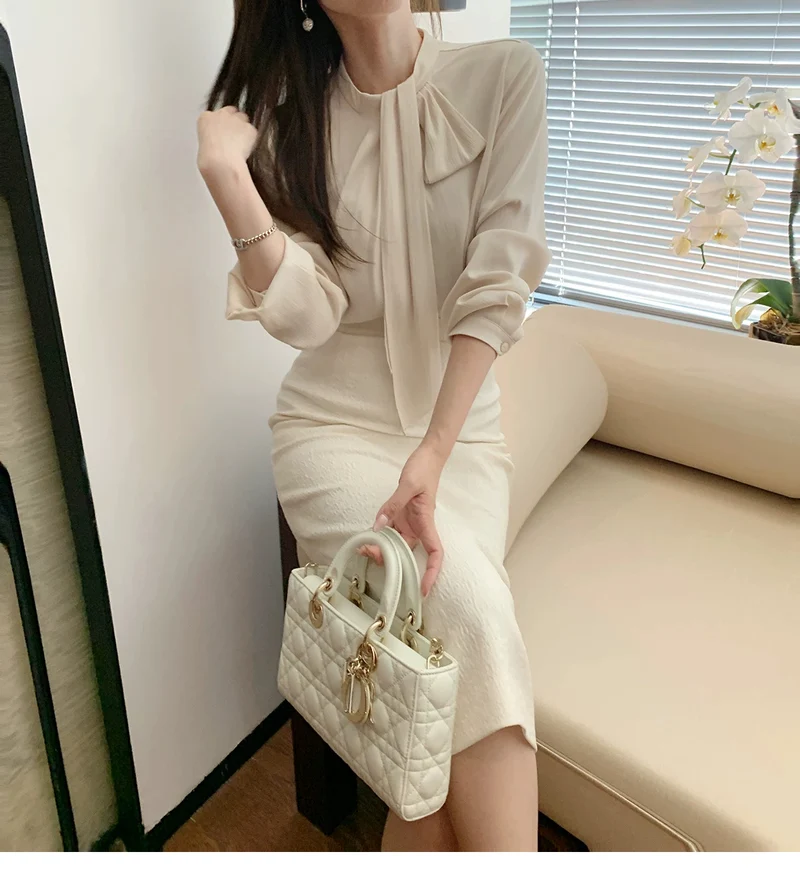 Damen Elegante und figurbetonte Bluse mit Schleifendetail Nord Taschen