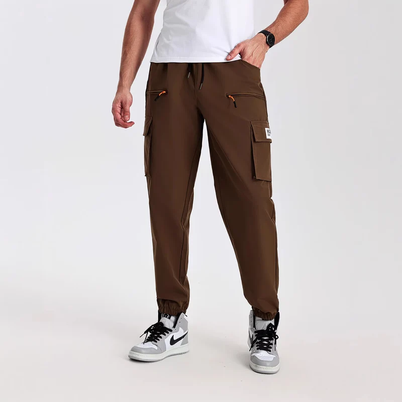 Herren konisch geschnittene Utility-Cargohose im Joggerstil mit Tunnelzugbund, Reißverschlusstaschen & elastischen Beinabschlüssen Nord Taschen