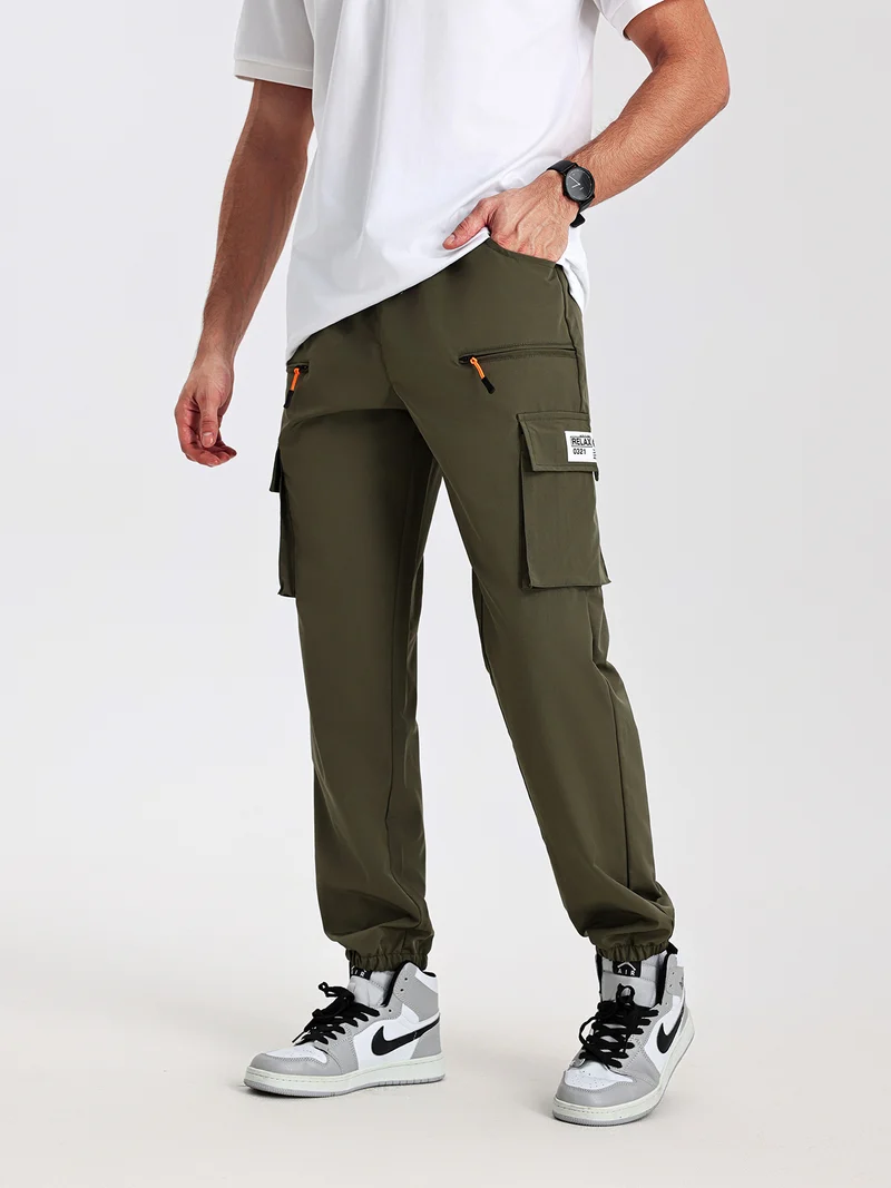 Herren konisch geschnittene Utility-Cargohose im Joggerstil mit Tunnelzugbund, Reißverschlusstaschen & elastischen Beinabschlüssen Nord Taschen