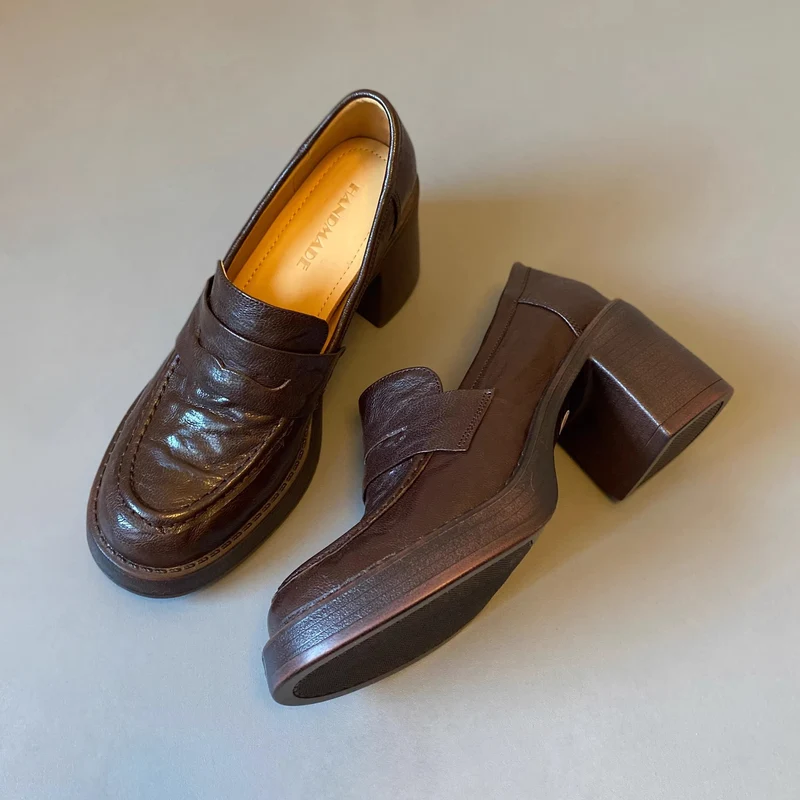 Damen Hochabsatz-Pennyloafer mit massivem Blockabsatz und profilierter Sohle Nord Taschen