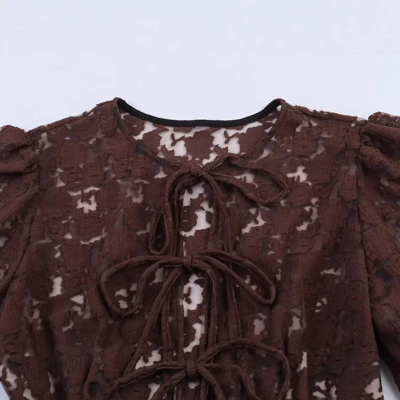 Damen Transparente Spitzenbluse mit frontalen Bindebändern und Volant‑Saum Nord Taschen