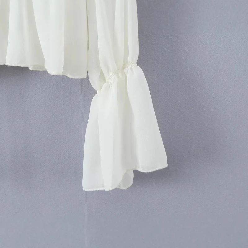 Damen Transparente Chiffonbluse mit Rüschenbindern, Stufenschnitt und Taillenraffung Nord Taschen