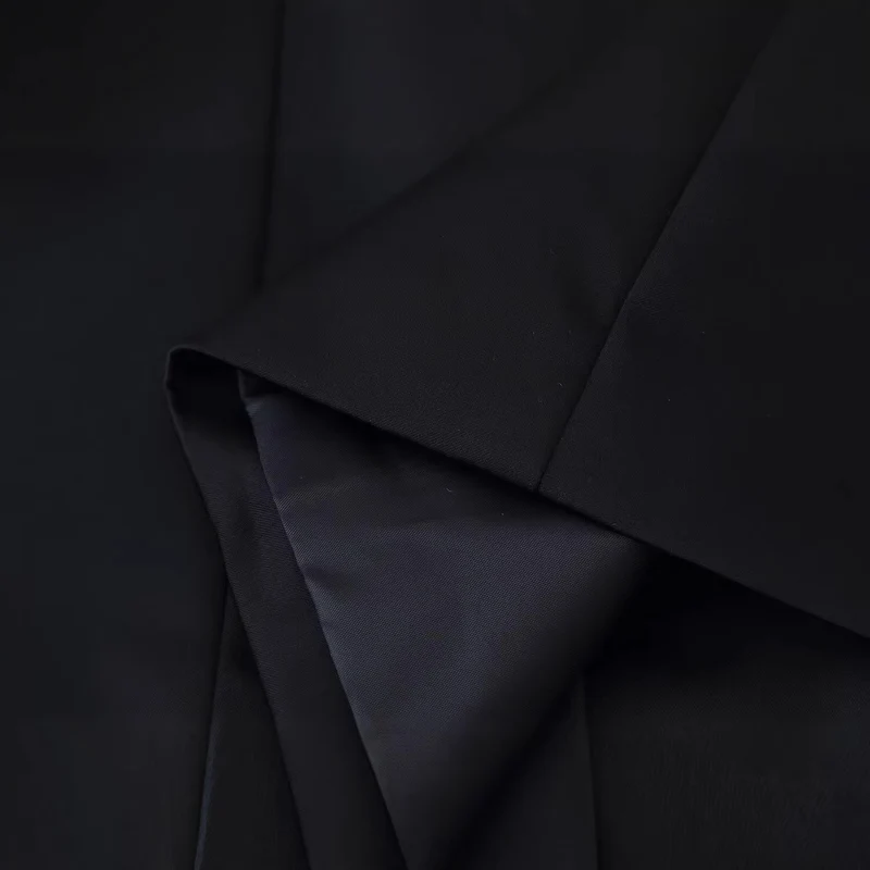 Damen Taillierte Kurzjacke im Mandarinstil mit dekorativen Zierknoten Nord Taschen