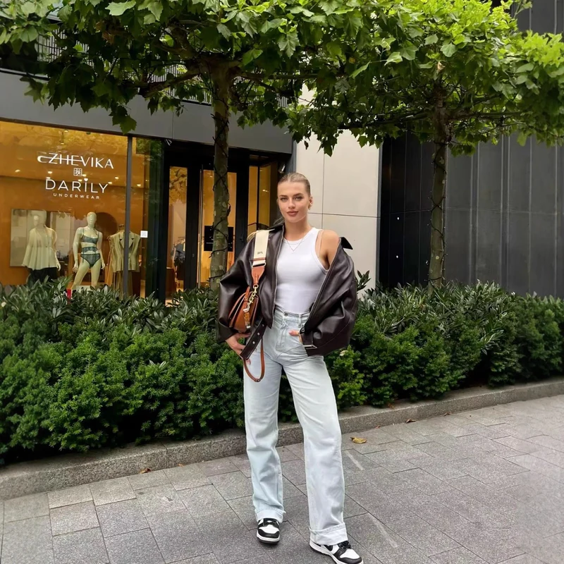 Damen Oversized Kunstleder-Bomberjacke mit Gürtel und Hemdkragen Nord Taschen