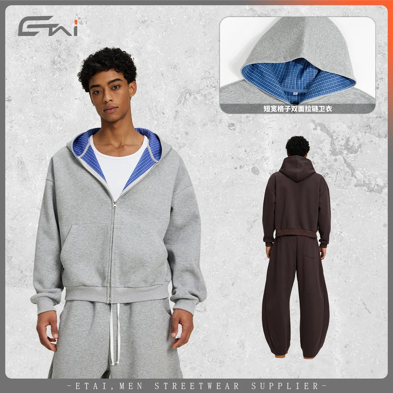 Unisex Kurz geschnittene Oversize-Kapuzenjacke mit durchgehendem Reißverschluss, kariert gefütterter Kapuze und Kängurutasche Nord Taschen