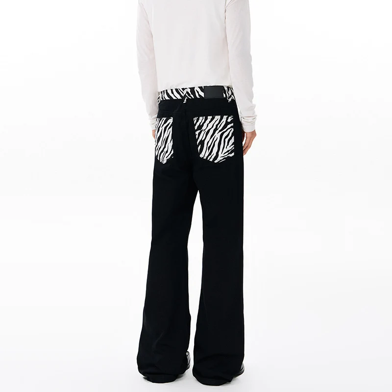 Herren weite Baumwollmix-Hose im Palazzoschnitt mit kontrastierenden Zebra-Print Gesäßtaschen Nord Taschen