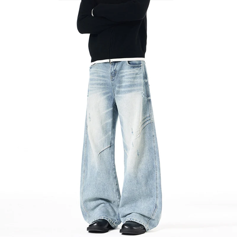Herren Ultraweite Denim-Palazzohose mit skulpturalen Seitenbahnen und Used‑Effekt Nord Taschen