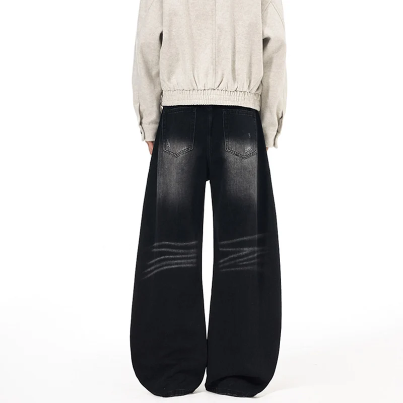 Herren Ultraweite Denim-Palazzohose mit skulpturalen Seitenbahnen und Used‑Effekt Nord Taschen
