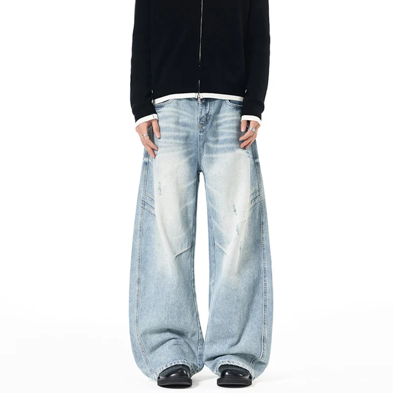 Herren Ultraweite Denim-Palazzohose mit skulpturalen Seitenbahnen und Used‑Effekt Nord Taschen
