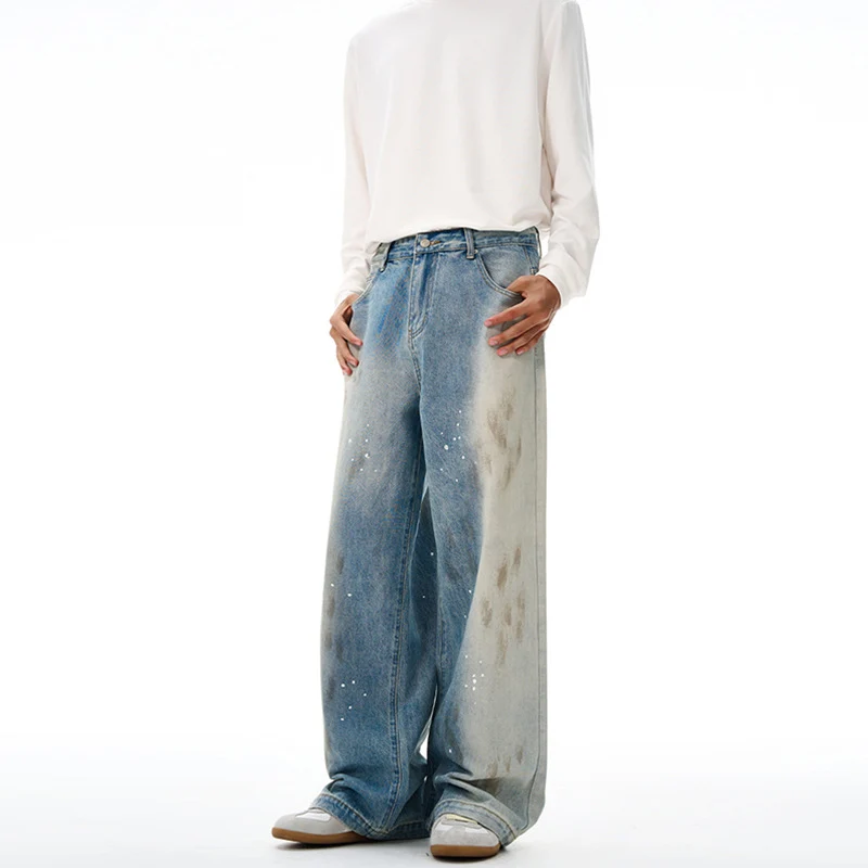 Herren Oversize-Baggy-Denim-Jeans mit künstlerischem Farb-Splatter und weitem Saum Nord Taschen