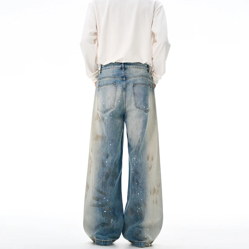 Herren Oversize-Baggy-Denim-Jeans mit künstlerischem Farb-Splatter und weitem Saum Nord Taschen