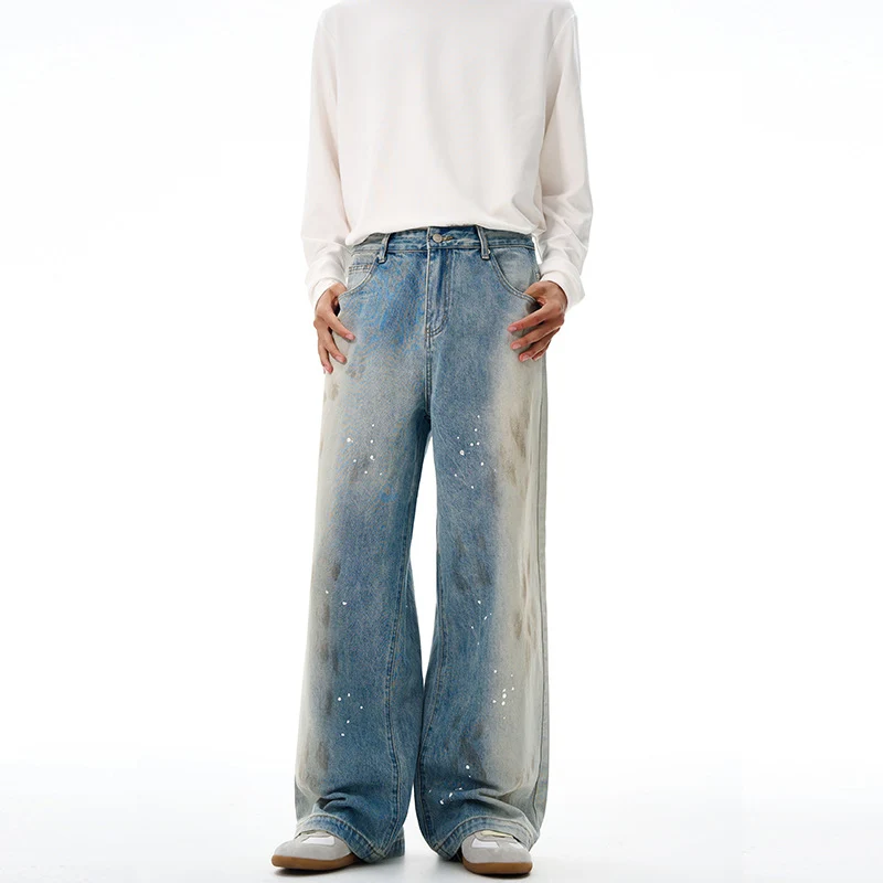 Herren Oversize-Baggy-Denim-Jeans mit künstlerischem Farb-Splatter und weitem Saum Nord Taschen