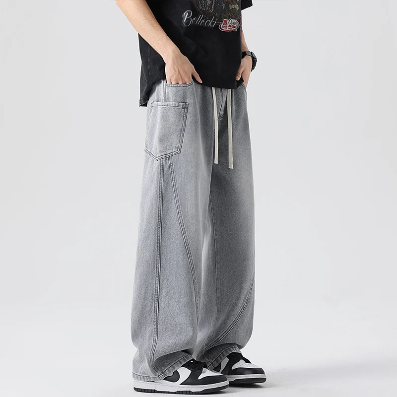 Herren Extraweite Denim-Baggyhose mit Tunnelzugbund und Paneelnähten Nord Taschen
