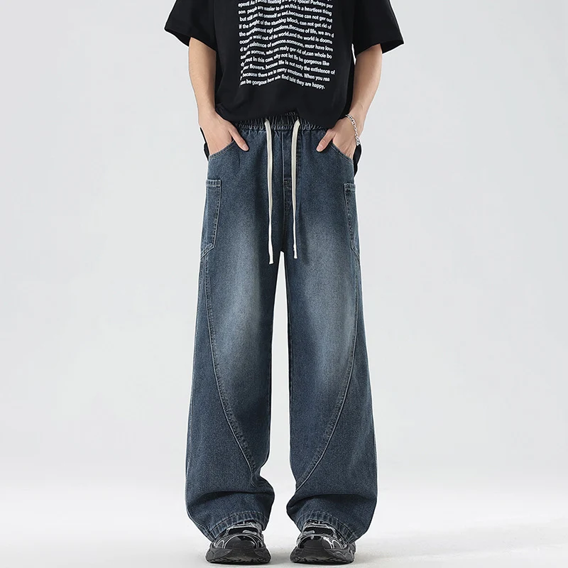 Herren Extraweite Denim-Baggyhose mit Tunnelzugbund und Paneelnähten Nord Taschen
