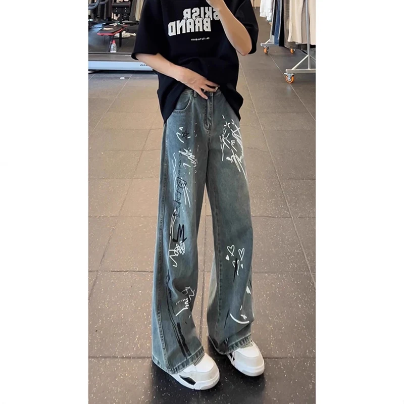 Damen Weitgeschnittene Jeans mit künstlerischem Grafikdruck Nord Taschen