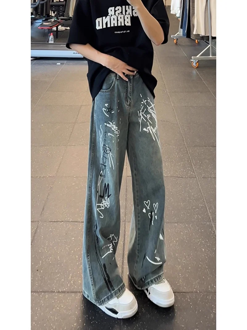 Damen Weitgeschnittene Jeans mit künstlerischem Grafikdruck Nord Taschen