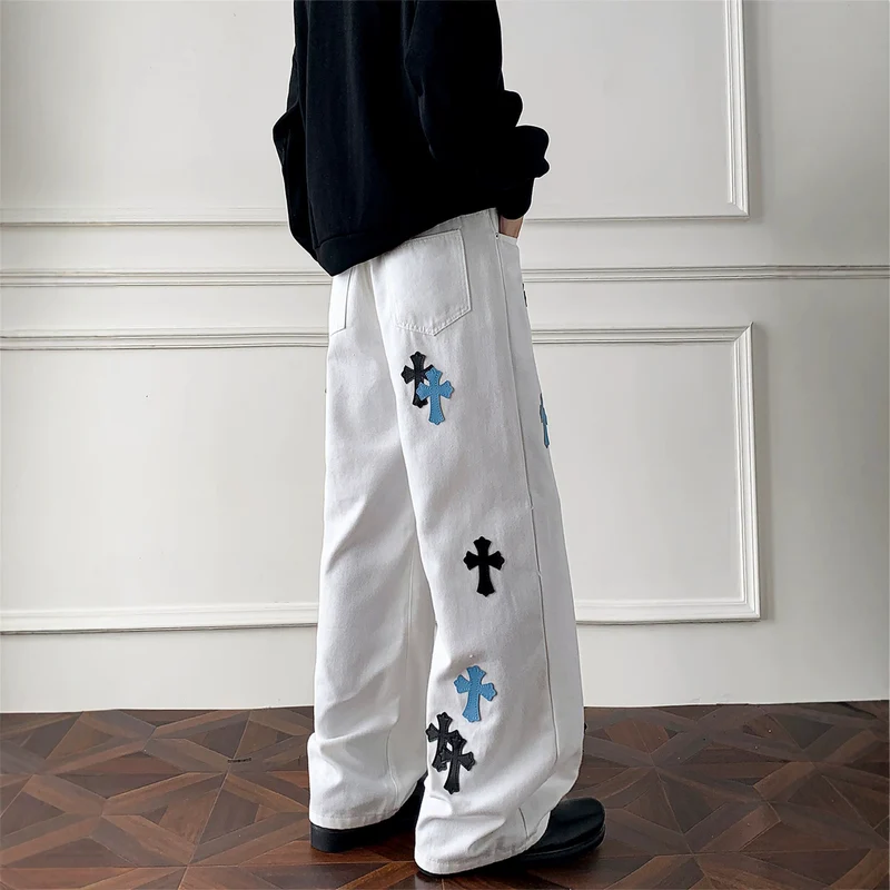 Damen Weitgeschnittene Denim-Hose mit kreativem Kreuzdesign Nord Taschen