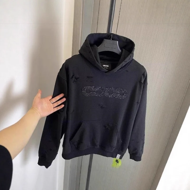 Damen Oversized Kapuzenpullover mit zerrissenen Details Nord Taschen