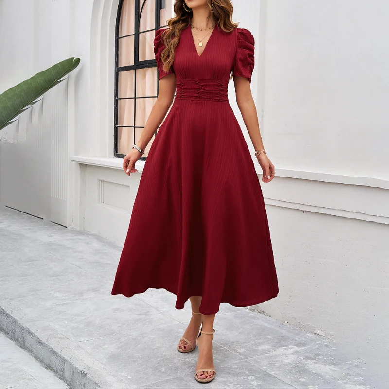 Damen Maxikleid mit elegant verarbeiteten Puffärmeln und taillierter Silhouette Nord Taschen