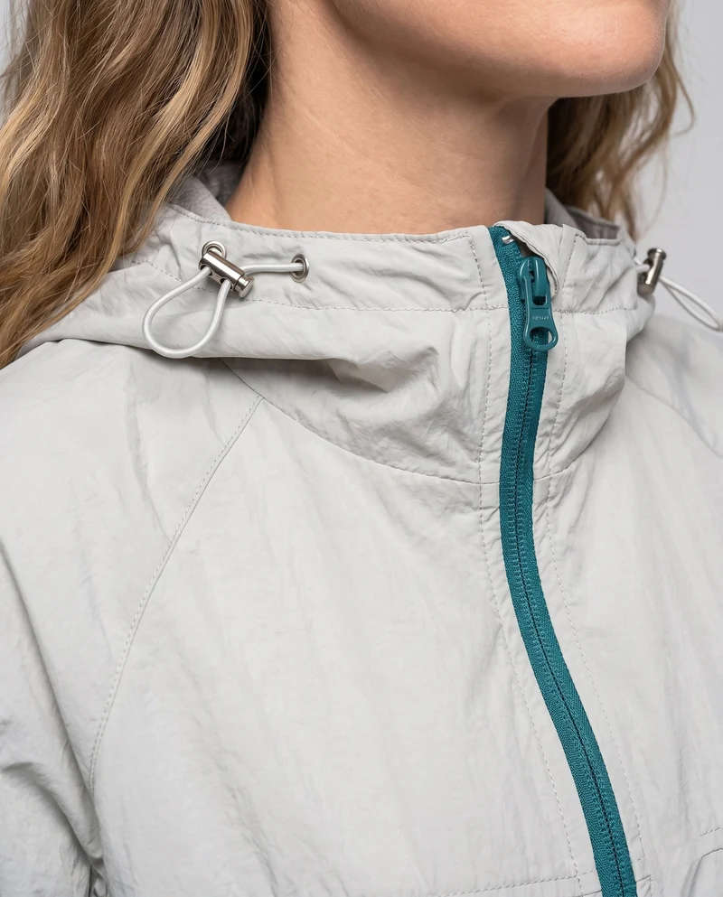 Damen Leichte Windjacke mit praktischen Taschen und verstellbarer Kapuze