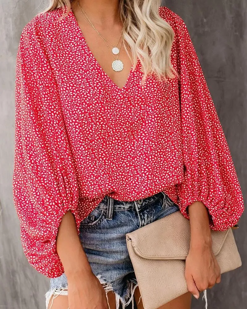 Damen Bluse mit weiten Ärmeln und floralem Muster