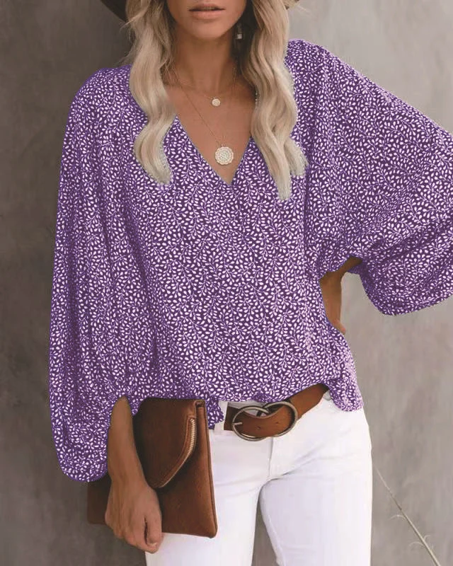 Damen Bluse mit weiten Ärmeln und floralem Muster