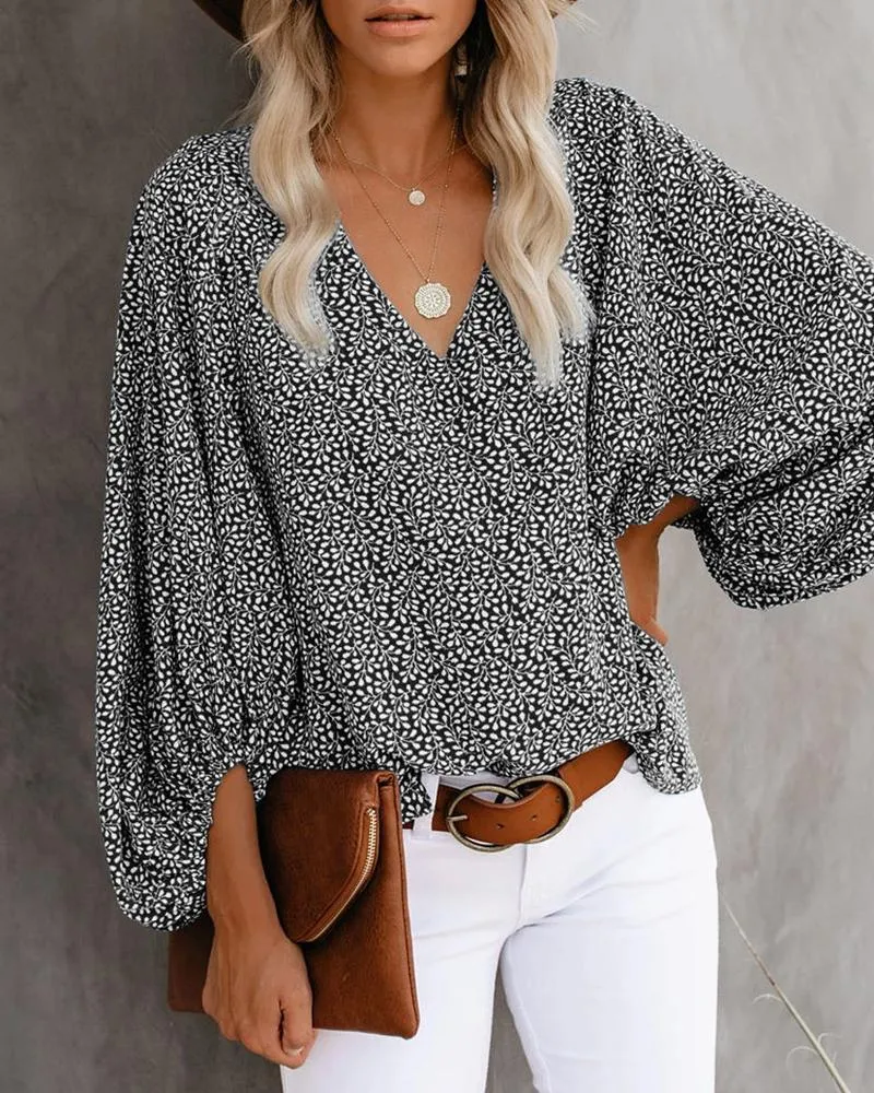 Damen Bluse mit weiten Ärmeln und floralem Muster