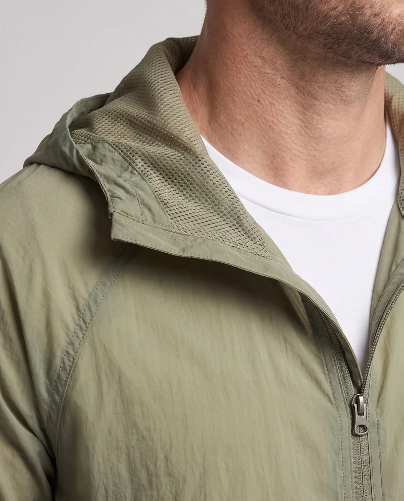 Unisex nan ultraleichte atmungsaktive Windjacke mit Kapuze, Packfunktion und Kordelzug Nord Taschen