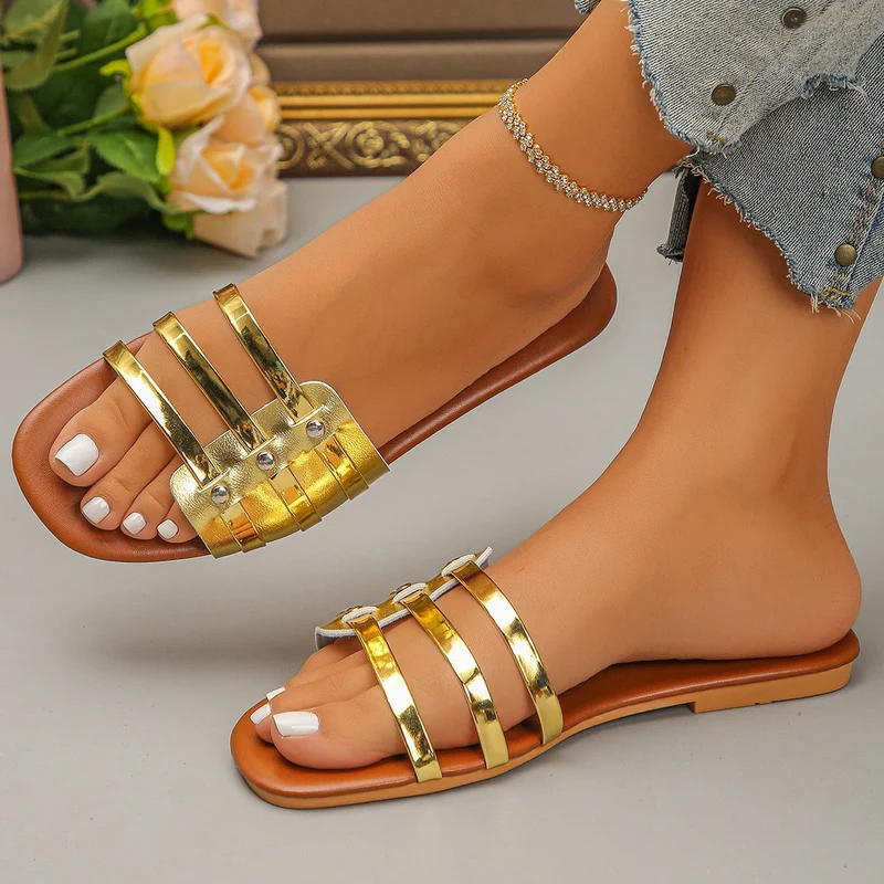 Damen Glamouröse Riemchen-Sandalen mit goldenen Akzenten Nord Taschen