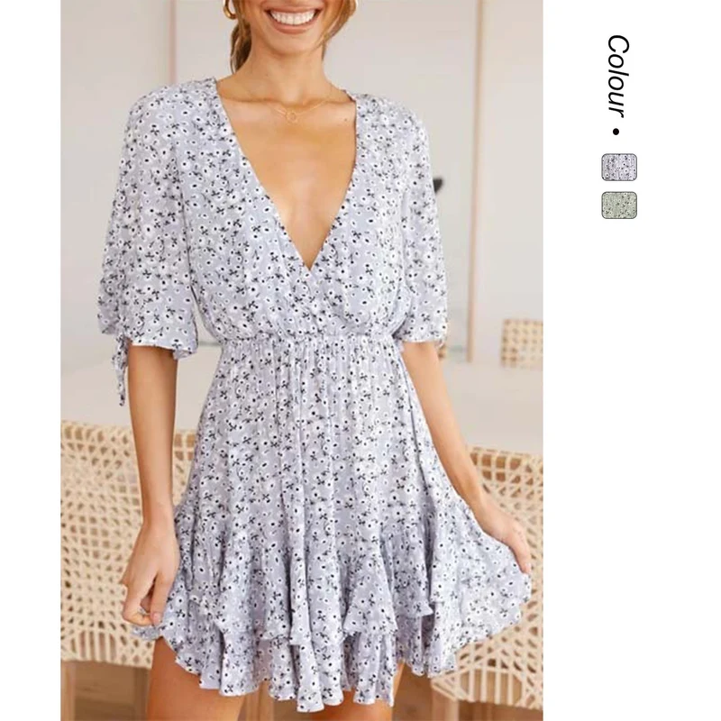 Damen Mini-Kleid mit verspieltem Blumendruck und fließendem Saum