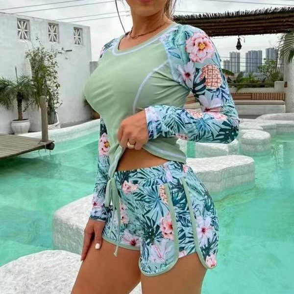 Damen Sportliches Langarm-Badeoberteil mit floralem Design und Shorts