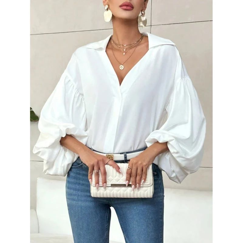 Damen Bluse mit voluminösen Ballonärmeln und elegantem Kragen