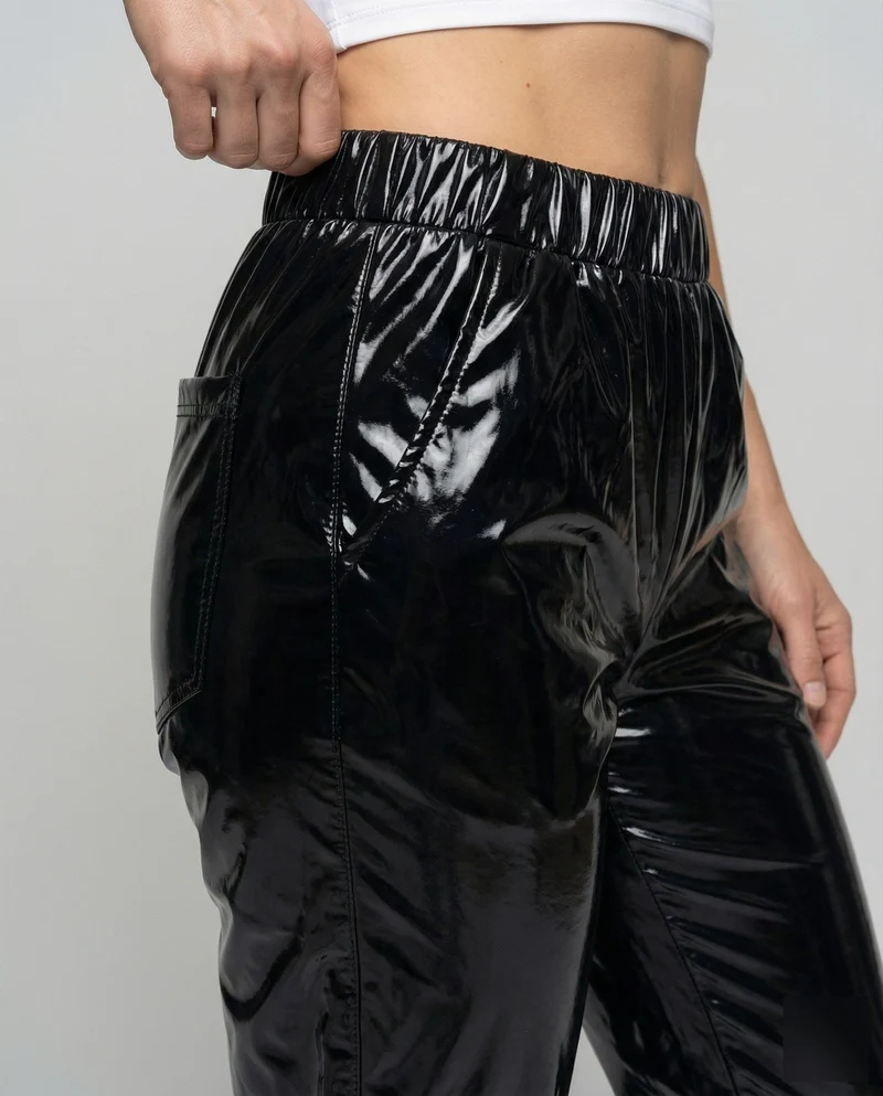 Damen nan Lamé-Joggerhose mit hohem Bund, elastischen Knöchelabschlüssen und glänzendem Finish Nord Taschen