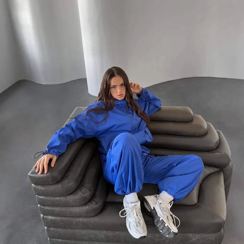 Damen leichte Windjacke im Oversized Schnitt mit Kordelzug und Druckknopfdetails Nord Taschen